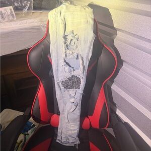 AMIRI Faded Blue Ripped Skinny Jeans